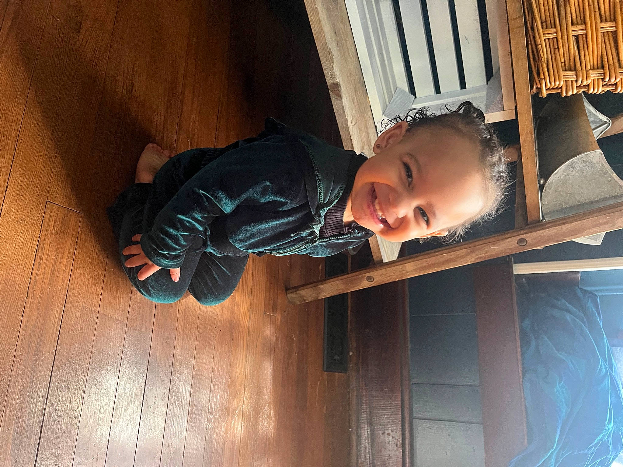 Aniyah is registered to the contest to win money with this photo: baby_toddler_clothing, child, door, eye, flash_photography, fun, happy, hardwood, house, joy, nose, person, room, sitting, smile, tints_and_shades, toddler, window, wood