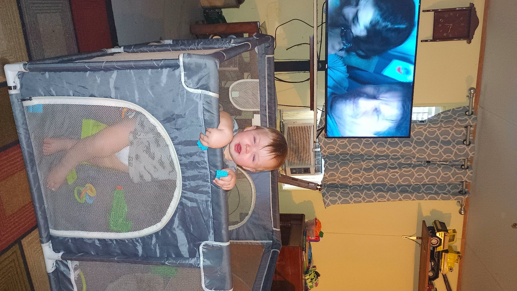 Gareth is registered to the contest to win money with this photo: art, audio_equipment, child, comfort, display_device, electronic_device, flat_panel_display, fun, home_appliance, led_backlit_lcd_display, machine, mesh, multimedia, person, room, space, technology, television, television_set, toddler