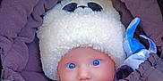 Thiago participe au concours pour gagner de l'argent avec cette photo : baby, child, blue_eyes, hat, fluffy_hat, panda_design, stroller, purple, blanket, warm_clothing, face, headwear, infant, cute, portrait, baby_clothes, snug, closeup, winter, outdoor