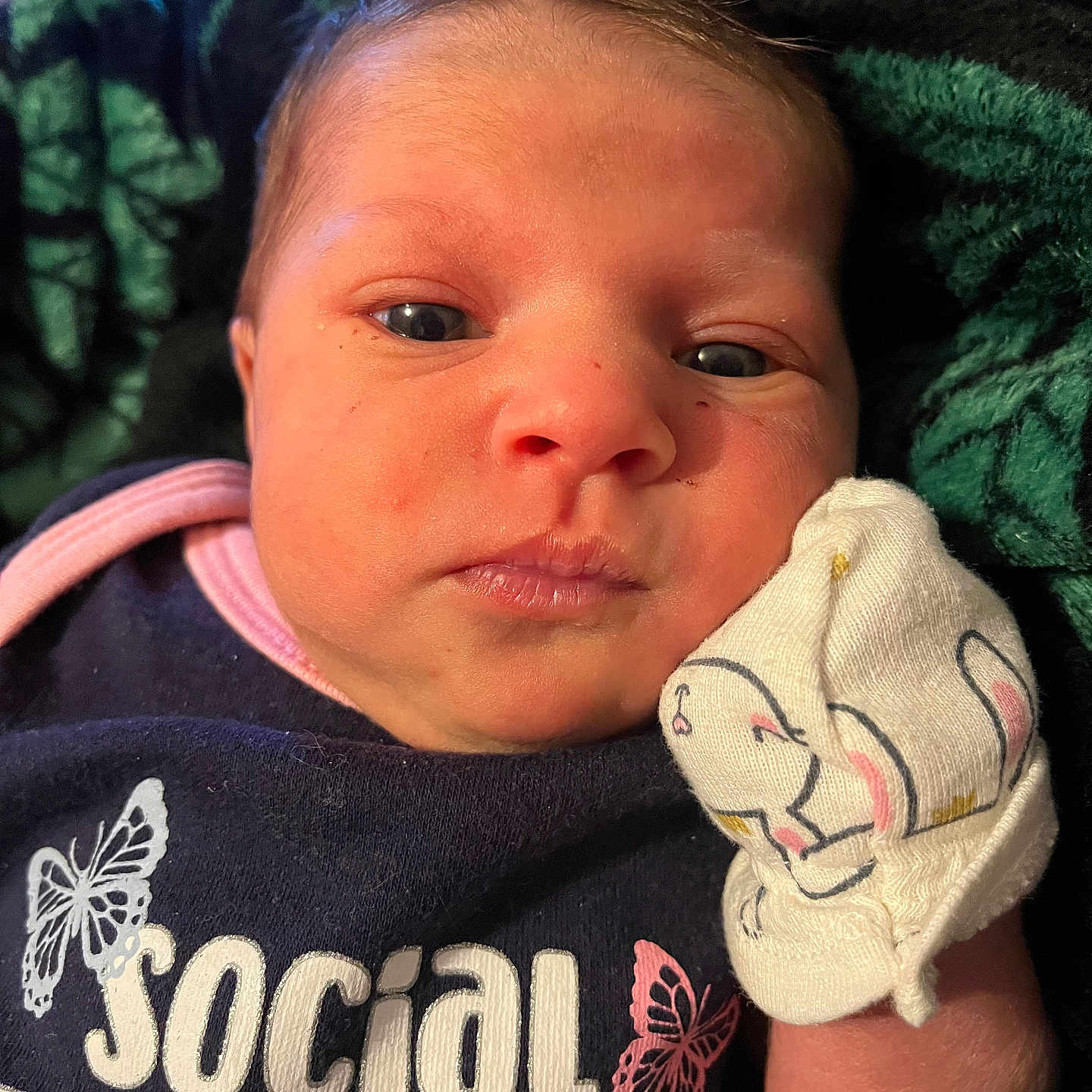 Kyzley joined the competition — help win amazing prizes! baby, blanket, blue, butterfly, closeup, clothing, cute, expression, face, head, indoor, infant, mitten, newborn, person, pink, portrait, skin, white, young_child