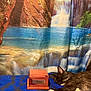 Paws joined the competition — help win amazing prizes! animal, black_and_white, blue_blanket, cat, curtain, fabric, fur, indoor, label, memorial, paws, pet, quiet, relaxation, resting, rock, sleeping, still_life, waterfall_backdrop, wooden_box