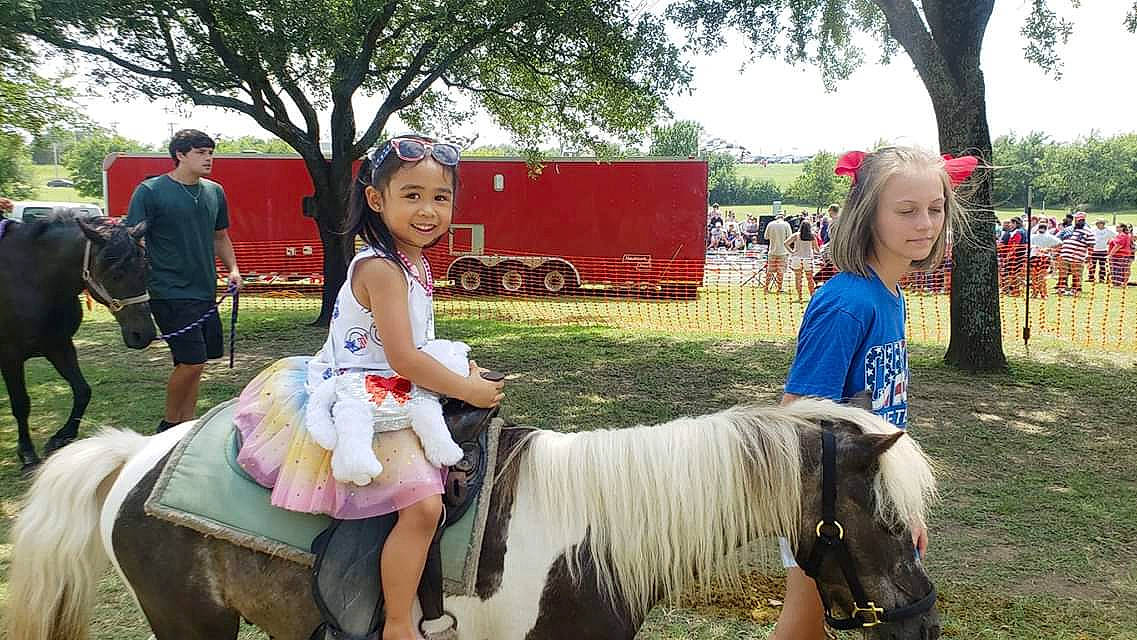 Megan is registered to the contest to win money with this photo: bridle, equestrianism, headwear, horse, horse_supplies, joy, landscape, livestock, mammal, mane, mare, pack_animal, person, pony, ranch, recreation, riding_instructor, shetland_pony, stallion, vertebrate
