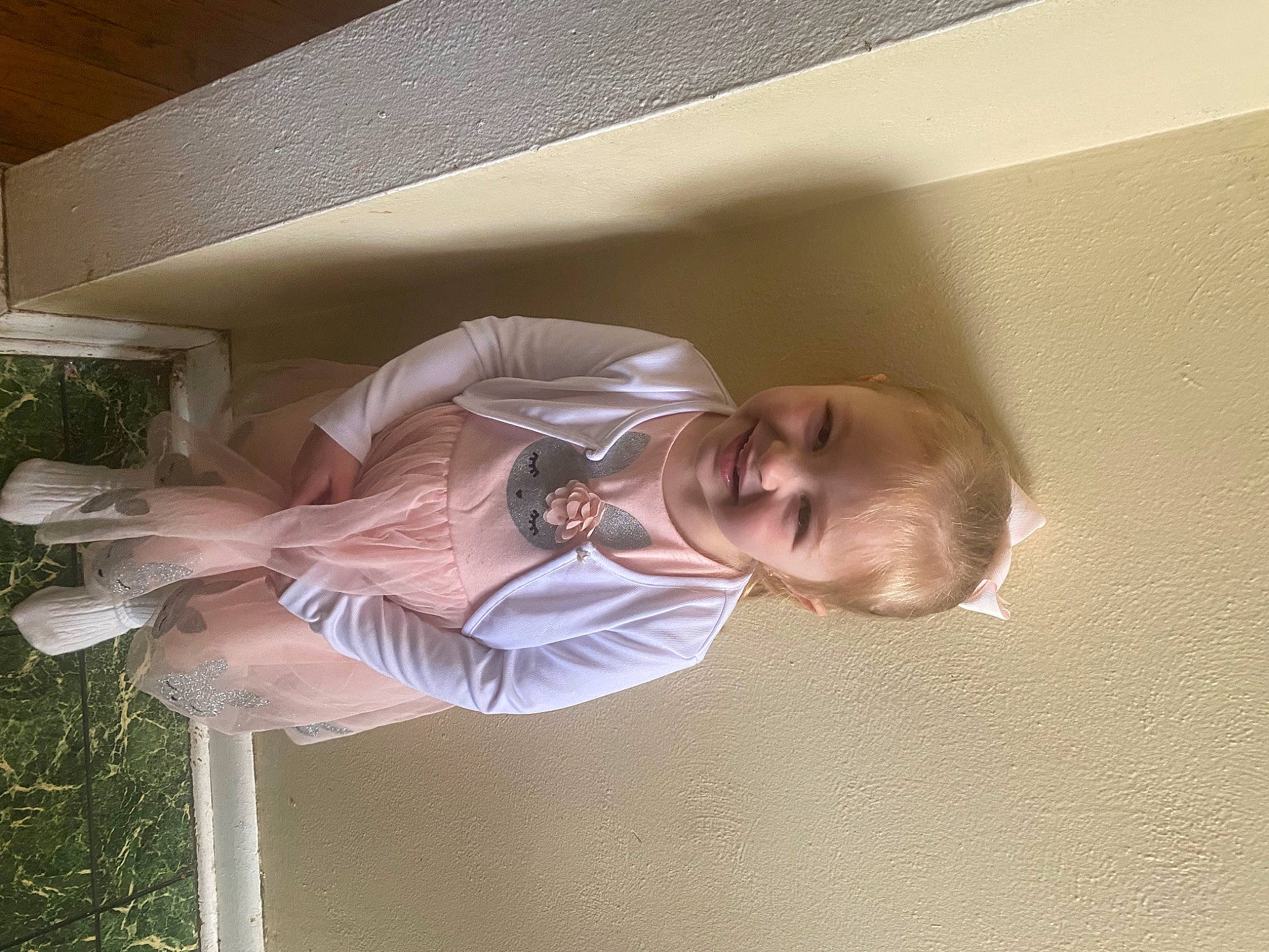 Ariana is registered to the contest to win money with this photo: baby, baby_products, ceiling, child, collar, comfort, dress_shirt, elbow, fun, happy, joy, person, plant, room, smile, toddler, window, wood