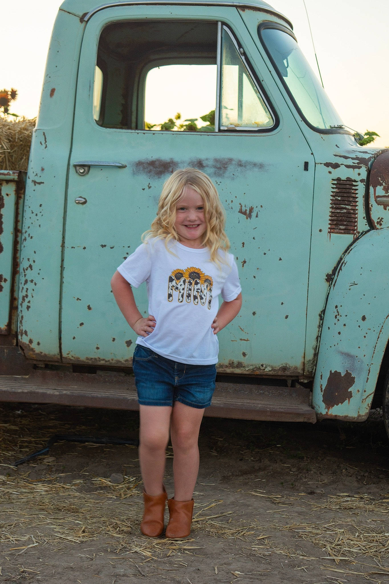 Raelynn joined the competition — help win amazing prizes! automotive_design, automotive_exterior, automotive_lighting, automotive_tire, automotive_wheel_system, bumper, commercial_vehicle, face, fender, joy, light_commercial_vehicle, motor_vehicle, person, shorts, sky, smile, t_shirt, tire, truck, vehicle