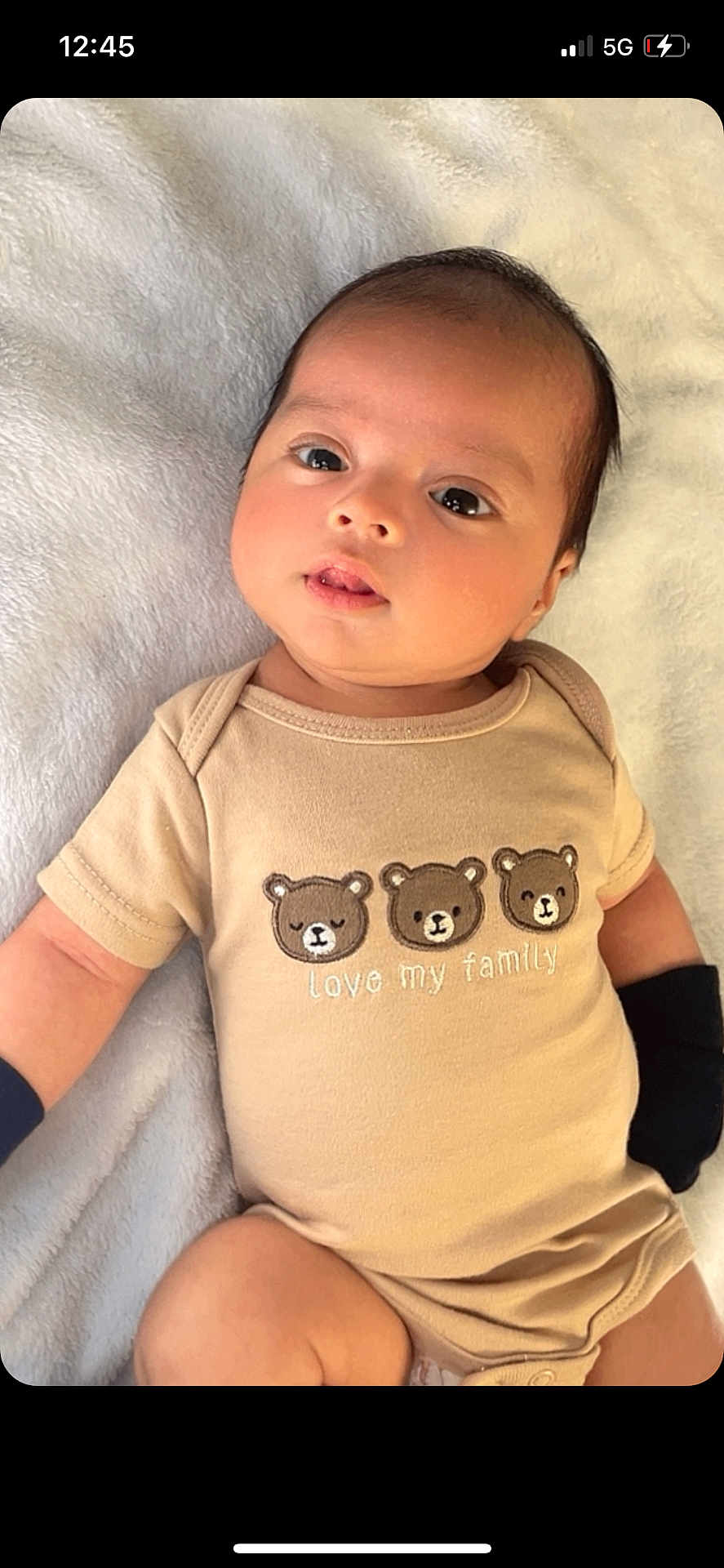 Abner Alberto joined the competition — help win amazing prizes! baby, infant, cute, onesie, bear_faces, love_my_family, mittens, blanket, soft_texture, lying_down, portrait, child, young, indoors, comfortable, expression, face, skin, head, eyes