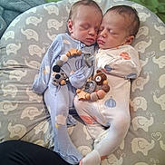 Hunter And Logan joined the competition — help win amazing prizes! newborn, twins, baby, sleeping, infant, portrait, cuddling, onesies, pacifier, teething_toy, nursing_pillow, elephant_pattern, indoors, bed, blanket, cozy, peaceful, family, close_up, photography