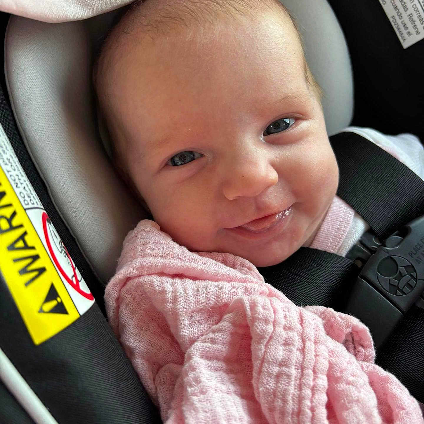 Aariah is registered to the contest to win money with this photo: accessories, baby, belt, blanket, car, car_interior, carseat, cushion, face, happy, head, homedecor, newborn, person, photography, portrait, sleeping, smile, transportation, vehicle