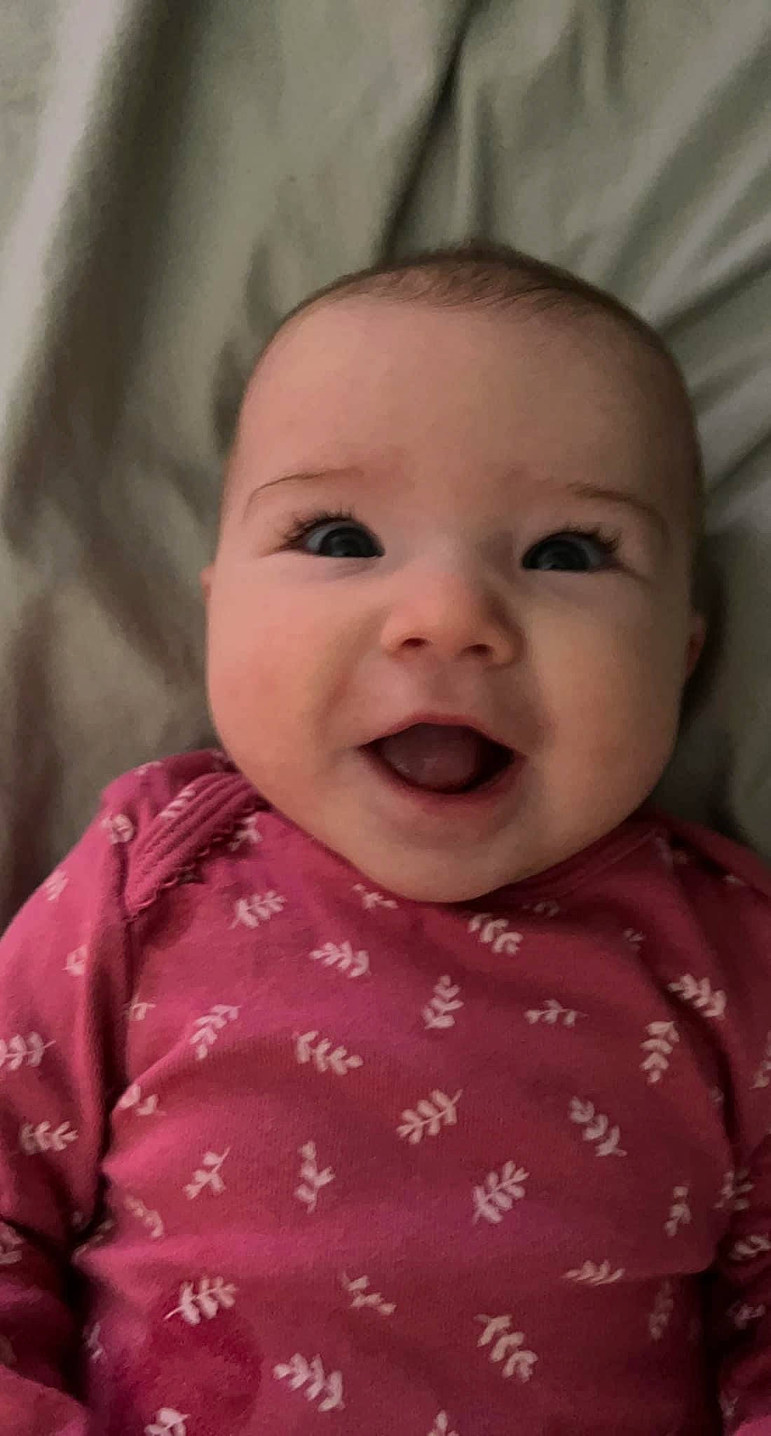 Emma joined the competition — help win amazing prizes! baby, baby_toddler_clothing, cheek, chin, eye, eyebrow, face, facial_expression, happy, head, iris, lip, mammal, mouth, nose, organ, person, skin, sleeve, smile