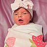 Kamylle joined the competition — help win amazing prizes! baby, newborn, infant, blanket, pink, bow, hat, face, wrapped, cute, child, soft, pattern, strawberry, portrait, indoors, sleepwear, headwear, expression, babywear