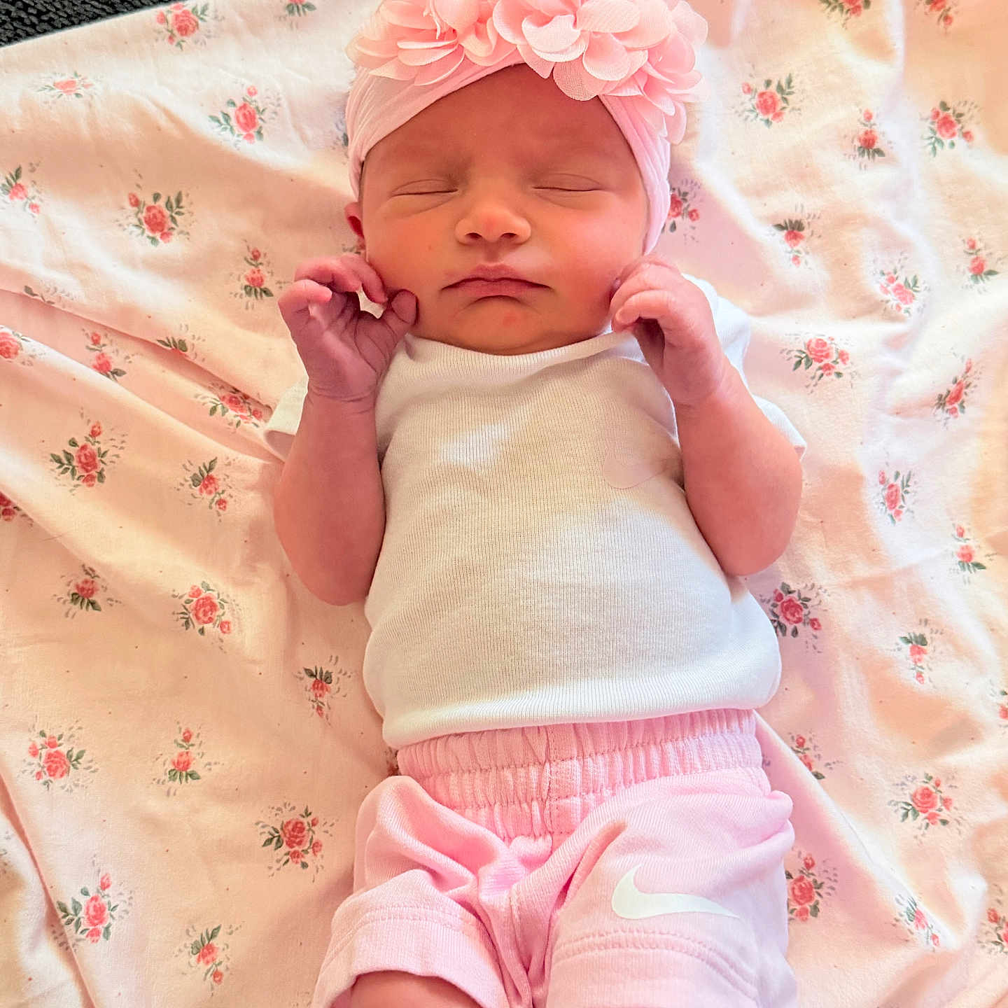 Kamylle is registered to the contest to win money with this photo: baby, newborn, infant, pink, headband, flower, sleeping, blanket, floral, clothing, cute, peaceful, small, person, laying, hands, soft, indoors, resting, toddler