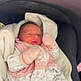 newborn, baby, infant, mittens, blanket, carrier, pink, white, floral, clothing, cozy, sleepy, cute, small, face, head, resting, indoors, soft, wrapped