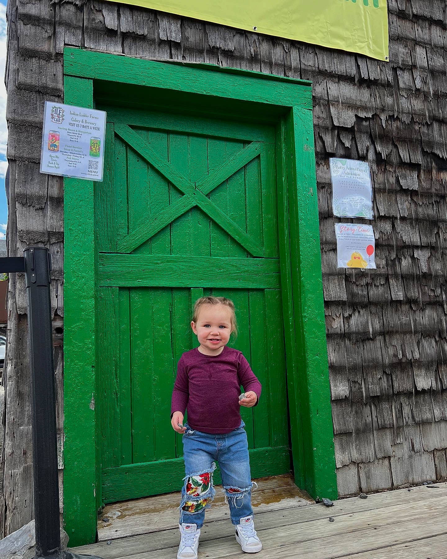 Addison is registered to the contest to win money with this photo: azure, beauty, blue, brick, cottage, door, facade, green, home_door, house, joy, leaf, line, people, people_in_nature, person, photograph, red, snapshot, standing