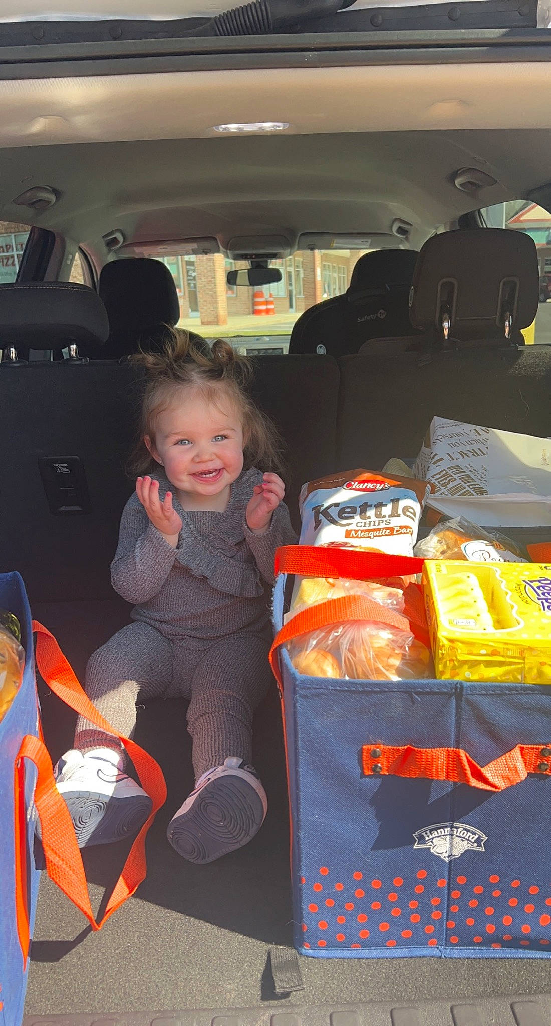 Addison is registered to the contest to win money with this photo: automotive_design, automotive_exterior, bag, car, car_seat, child, family_car, fun, joy, luggage_and_bags, luxury_vehicle, mid_size_car, motor_vehicle, packaging_and_labeling, person, personal_luxury_car, smile, toddler, toy, trunk