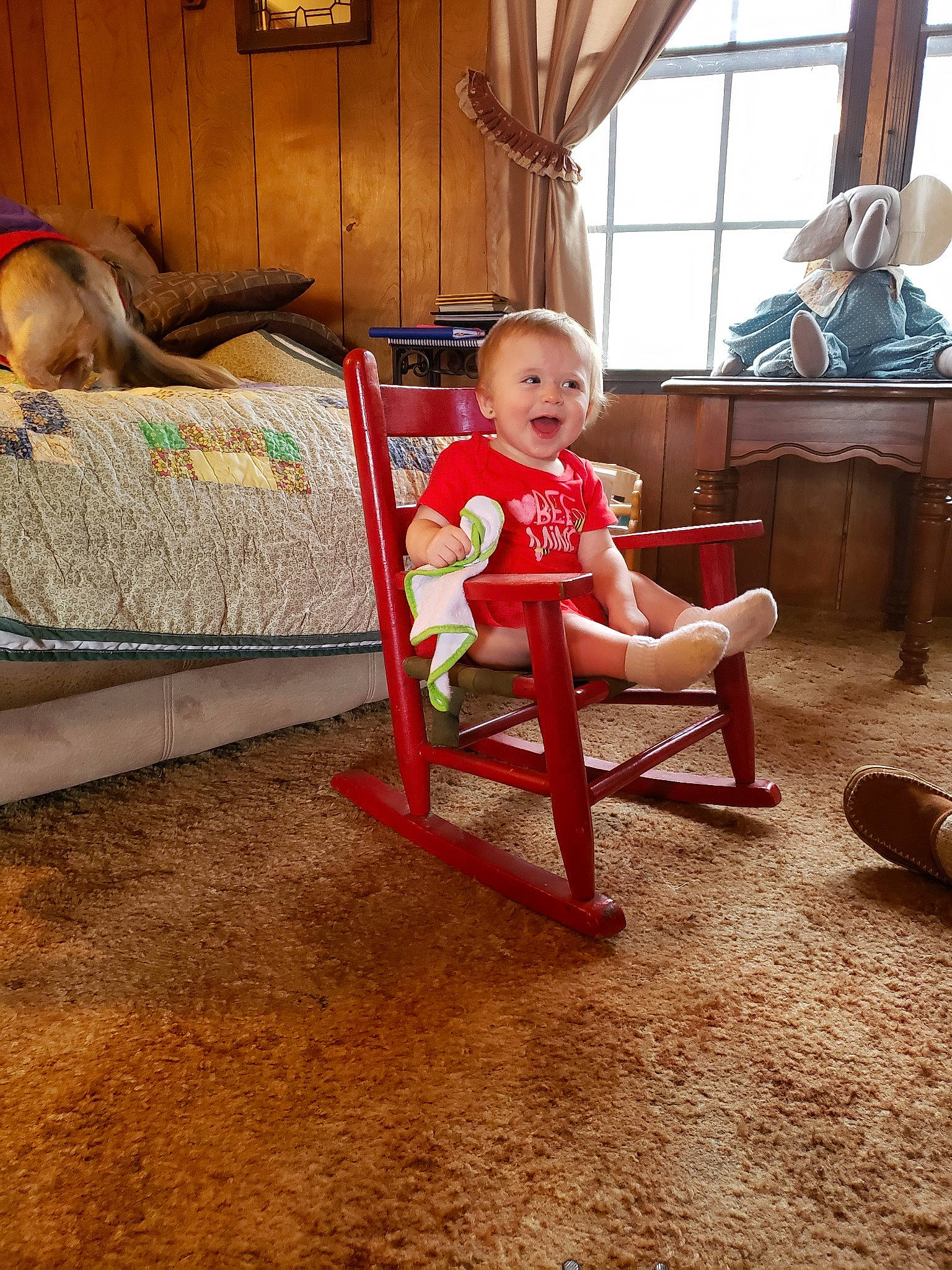 Beatrice joined the competition — help win amazing prizes! carpet, chair, child, floor, flooring, furniture, hardwood, person, play, room, sitting, toddler, wood