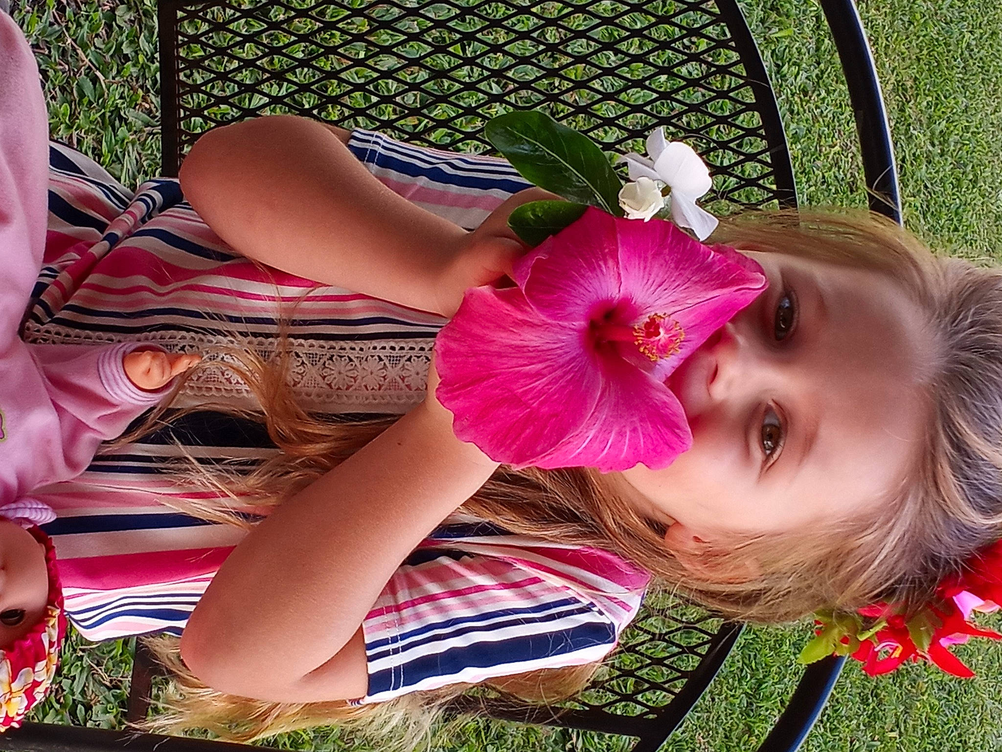 Braelyn joined the competition — help win amazing prizes! black_hair, cool, eyelash, flower, fun, grass, happy, human_leg, leisure, magenta, mouth, pattern, people_in_nature, person, petal, pink, plant, skin, textile, thigh