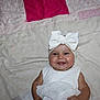 Autumn joined the competition — help win amazing prizes! baby, smile, white_bow, headwear, blanket, pink, white_dress, happy, infant, cute, portrait, child, indoors, soft_texture, fabric, skin, cheeks, eyes, hands, lying_down
