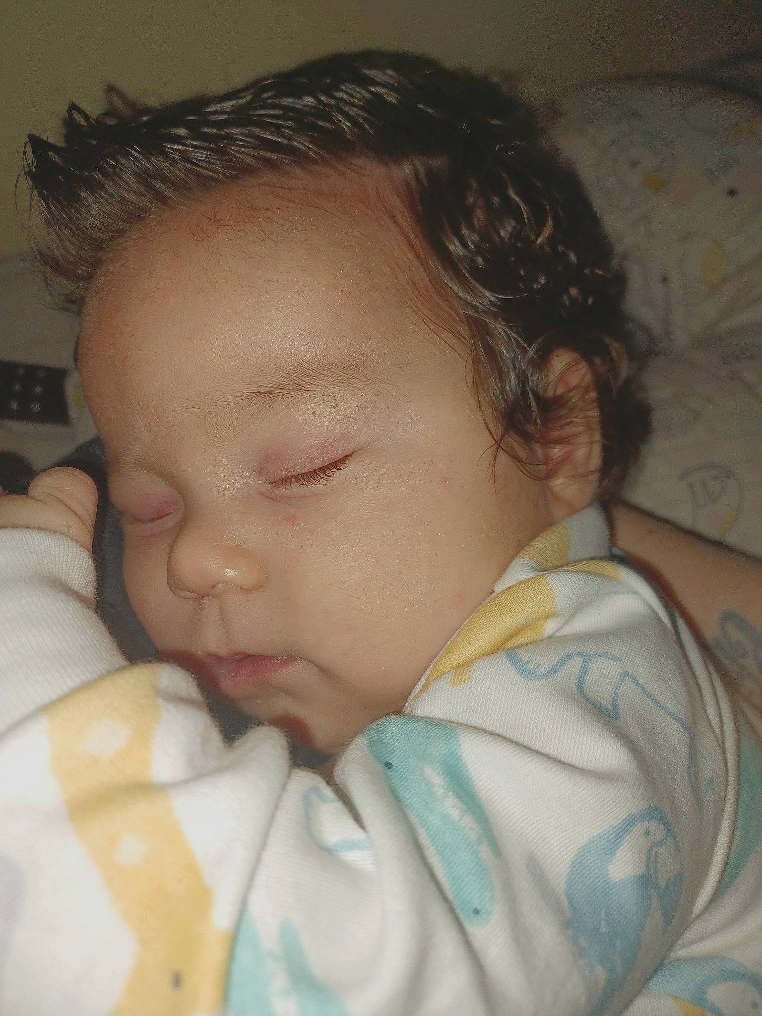 Noah is registered to the contest to win money with this photo: baby, cheek, chin, comfort, ear, eye, eyebrow, face, finger, forehead, gesture, hair, head, human_body, iris, lip, mouth, neck, nose, person