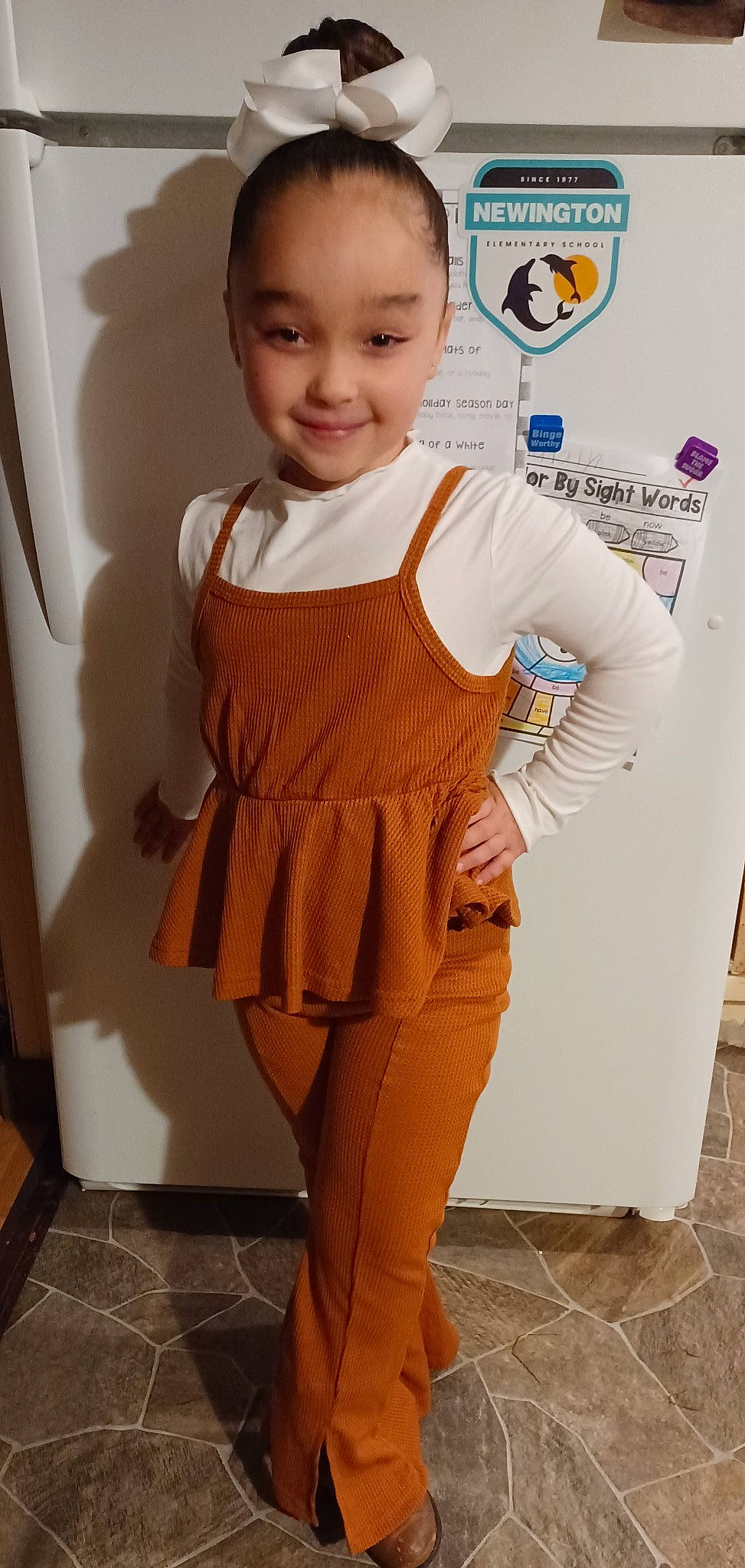 Madalyn is registered to the contest to win money with this photo: baby_toddler_clothing, blond, fashion_design, human_leg, joint, joy, knee, neck, outerwear, pattern, person, sleeve, smile, sportswear, standing, t_shirt, thigh, toddler, trunk, vest