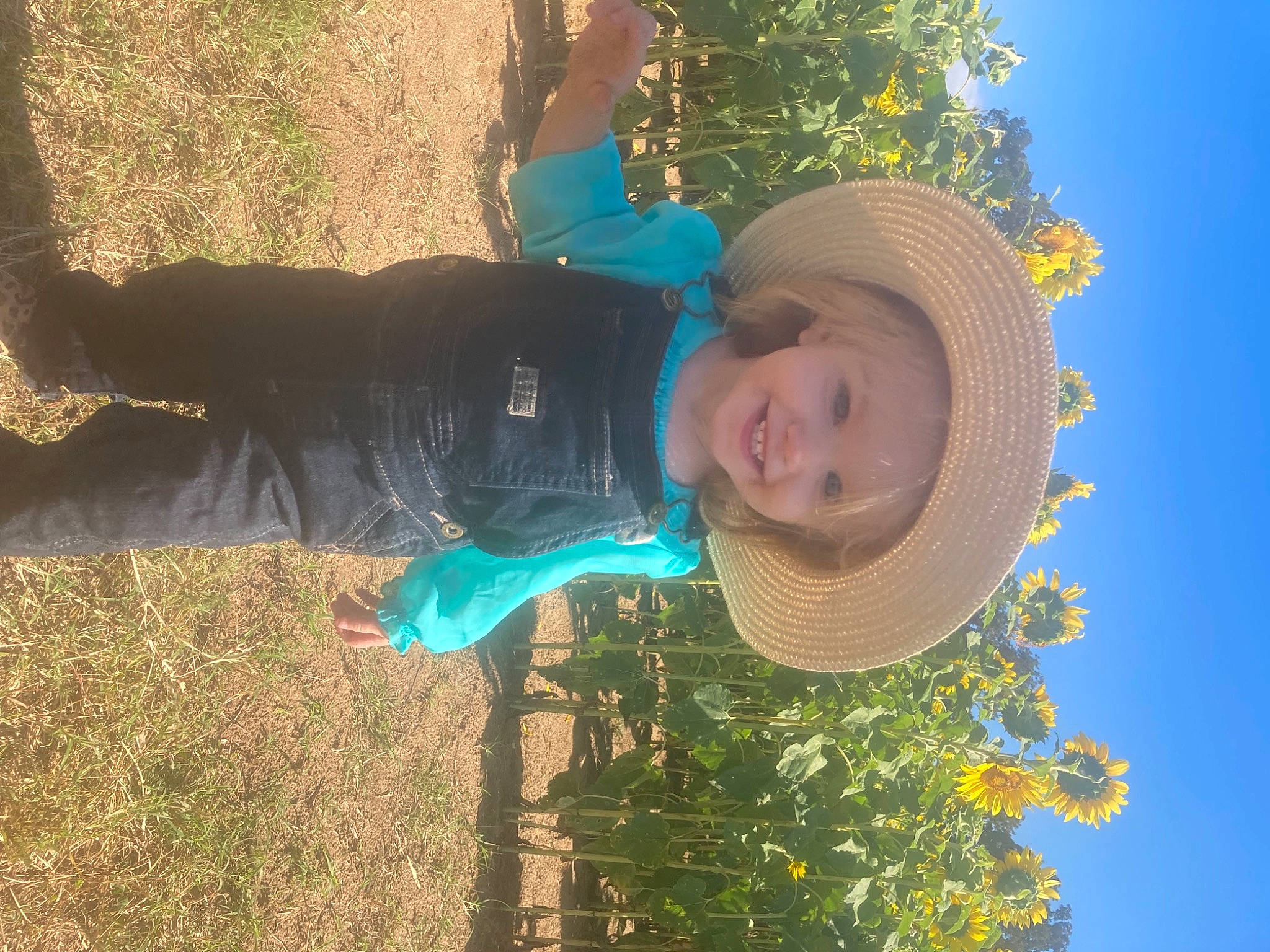 Azlynn joined the competition — help win amazing prizes! adaptation, child, clothing, electric_blue, fashion_accessory, fun, grass, happy, hat, headgear, joy, leisure, organism, people_in_nature, person, plant, sky, smile, sun_hat, toddler