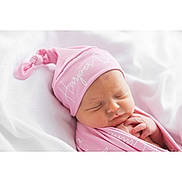 Harper joined the competition — help win amazing prizes! newborn, baby, sleeping, pink_hat, pink_blanket, infant, soft_texture, white_background, closeup, peaceful, wrapped, cute, child, portrait, resting, adorable, blanket, hat, newborn_photography, soft_lighting
