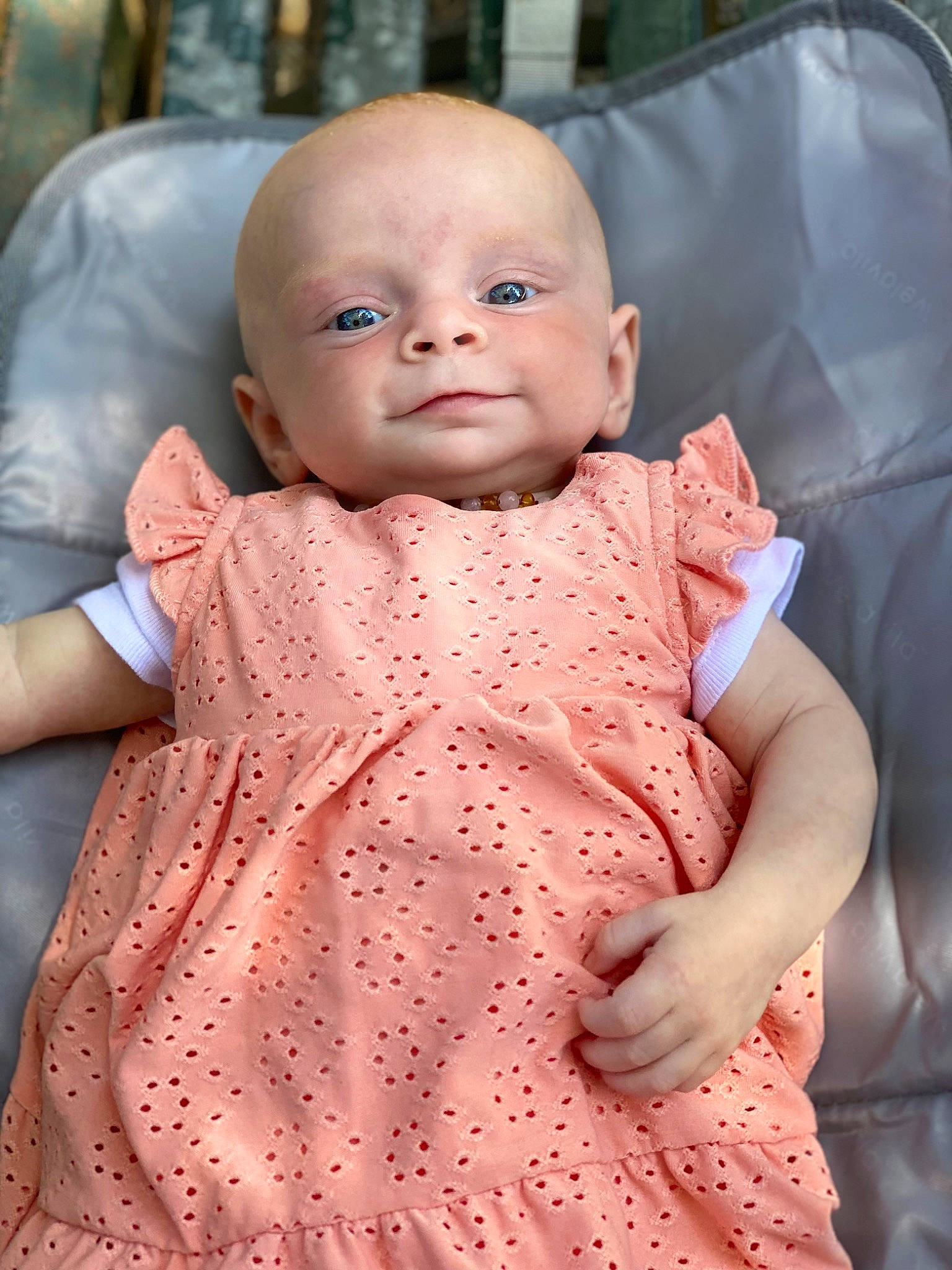 Aria participe au concours pour gagner de l'argent avec cette photo : baby, baby_toddler_clothing, cheek, chin, day_dress, dress, eye, finger, iris, joint, lip, neck, one_piece_garment, outerwear, people, person, pink, skin, sleeve, textile