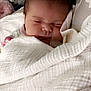 Raven is registered to the contest to win money with this photo: baby, sleeping, blanket, infant, face, cozy, pillow, bed, soft, peaceful, child, closeup, rest, comfort, indoor, cute, portrait, wrapped, newborn, peace