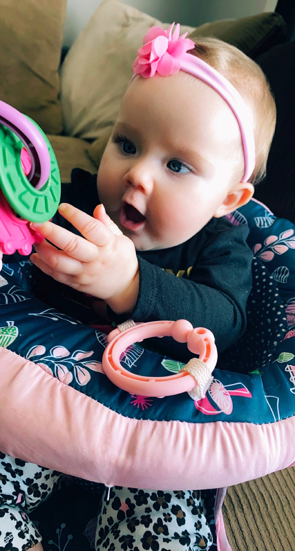 Miranda is registered to the contest to win money with this photo: baby, baby_products, baby_toddler_clothing, cheek, child, dress, face, finger, fun, grass, green, happy, headwear, iris, lip, nail, person, pink, skin, surprise