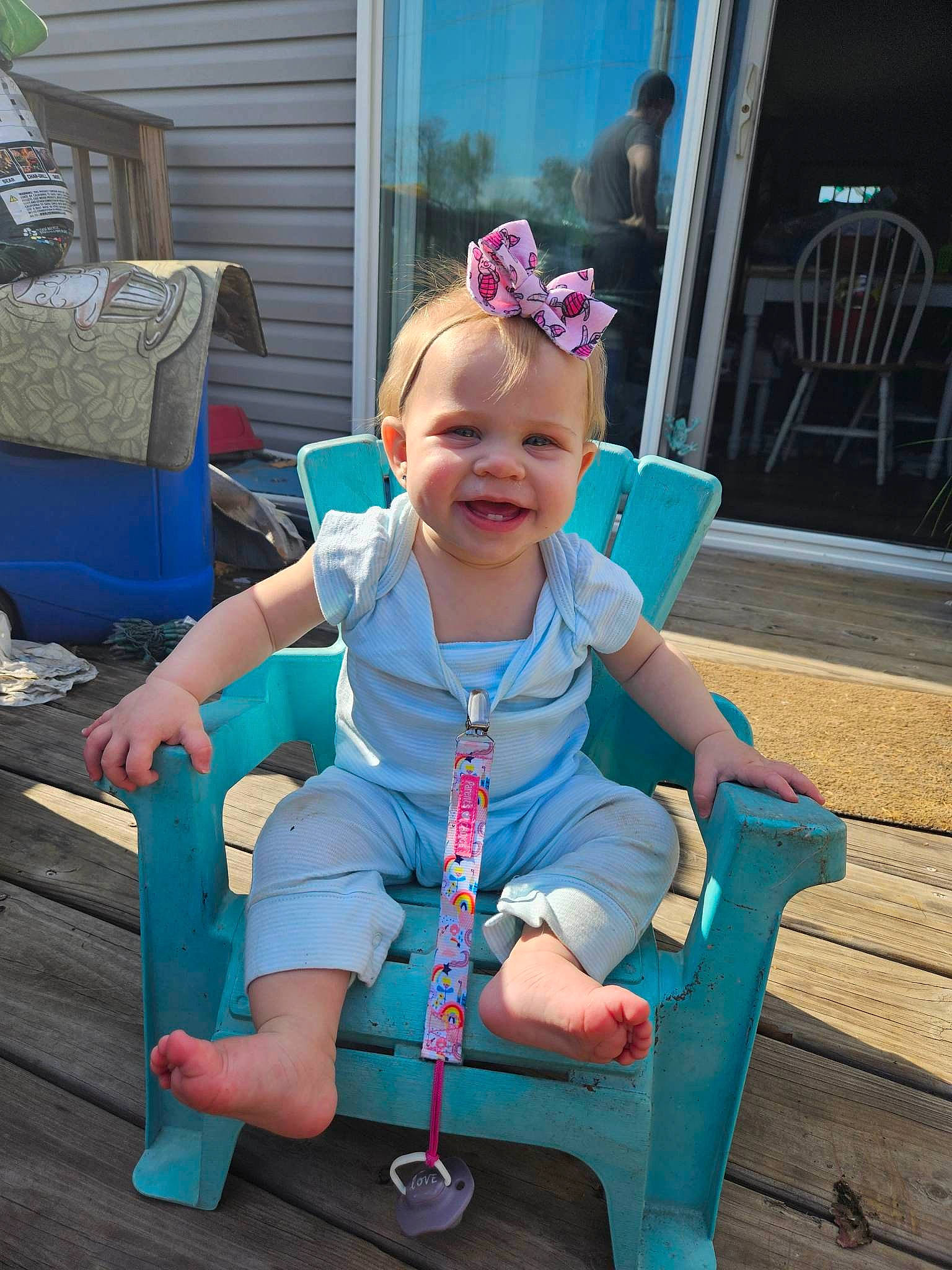 Lilliana is registered to the contest to win money with this photo: baby, baby_products, baby_toddler_clothing, chair, child, electric_blue, event, fashion_accessory, fun, grass, happy, joy, lap, leisure, outdoor_furniture, person, pink, plant, recreation, sitting