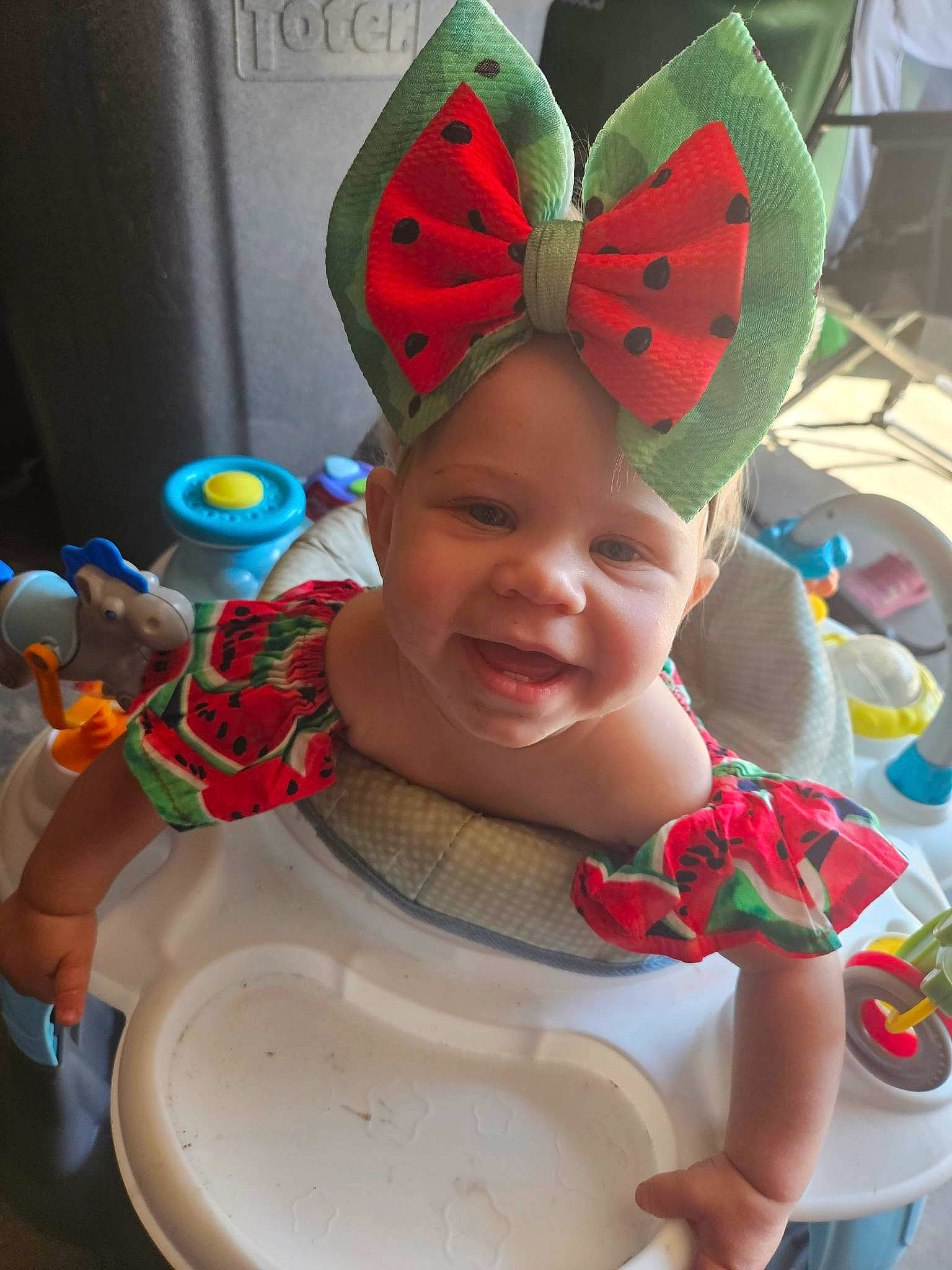 Lilliana is registered to the contest to win money with this photo: baby, baby_toddler_clothing, cap, carmine, child, costume_hat, event, eye, fashion_accessory, fun, happy, hat, head, headwear, party_supply, pattern, person, plant, red, skin