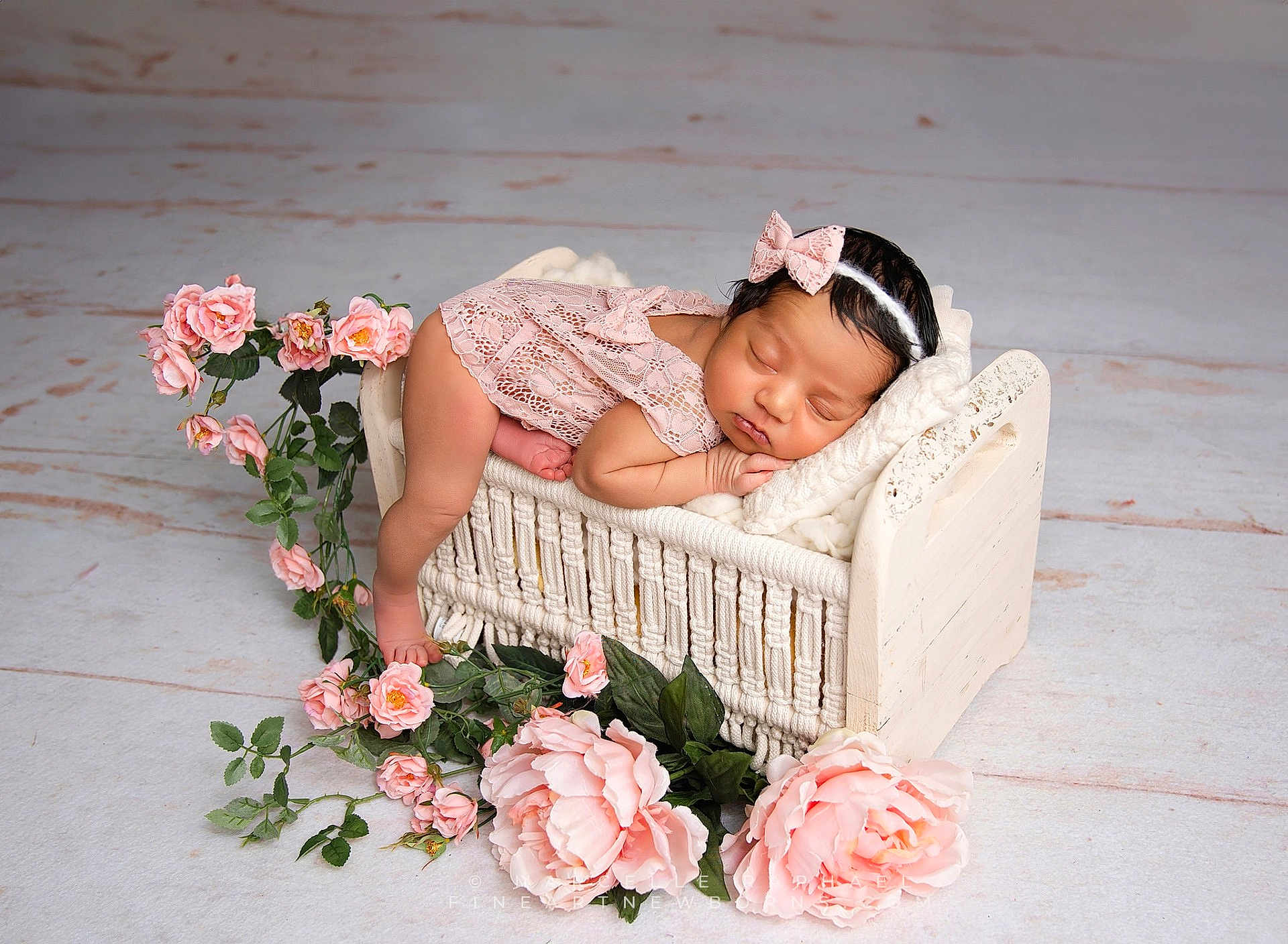 Rayna is registered to the contest to win money with this photo: newborn, baby, sleeping, pink_lace, headband, flower, mini_bed, blanket, soft, cute, infant, portrait, peaceful, decor, floral_arrangement, indoors, resting, cozy, tender, adorable