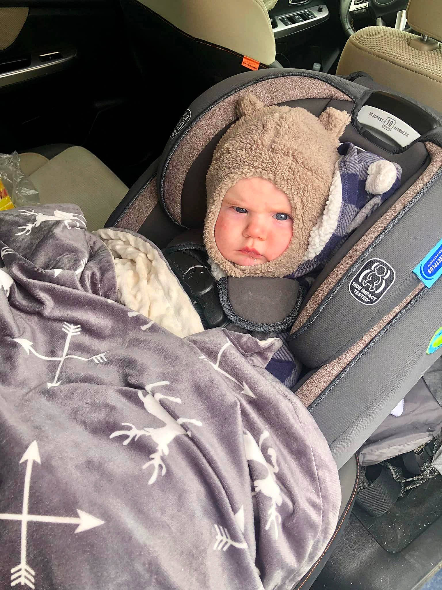 Bo joined the competition — help win amazing prizes! auto_part, automotive_design, baby, baby_carriage, baby_in_car_seat, baby_products, baby_safety, baby_sleeping, baby_toddler_clothing, car_seat, car_seat_cover, cheek, child, comfort, headwear, infant_bed, linens, nap, person, sitting