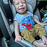 Lincoln is registered to the contest to win money with this photo: baby, car, clothing, crying, cushion, face, happy, head, homedecor, laughing, pants, person, photography, portrait, sad, shorts, smile, t_shirt, transportation, vehicle