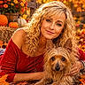 woman, dog, portrait, autumn, fall, outdoors, flowers, pumpkins, leaves, hay, fence, red_sweater, blonde_hair, curly_hair, pet, companion, smiling, sitting, blanket, nature