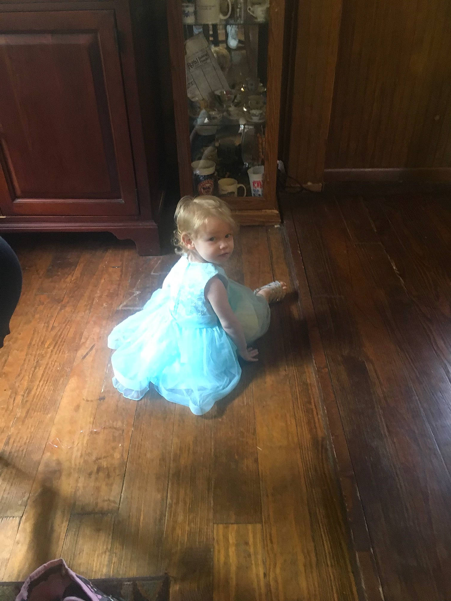 Nataliah is registered to the contest to win money with this photo: baby, baby_toddler_clothing, brown, cabinetry, child, comfort, floor, flooring, fun, hardwood, human_leg, laminate_flooring, leg, living_room, person, plank, toddler, varnish, wood, wood_flooring