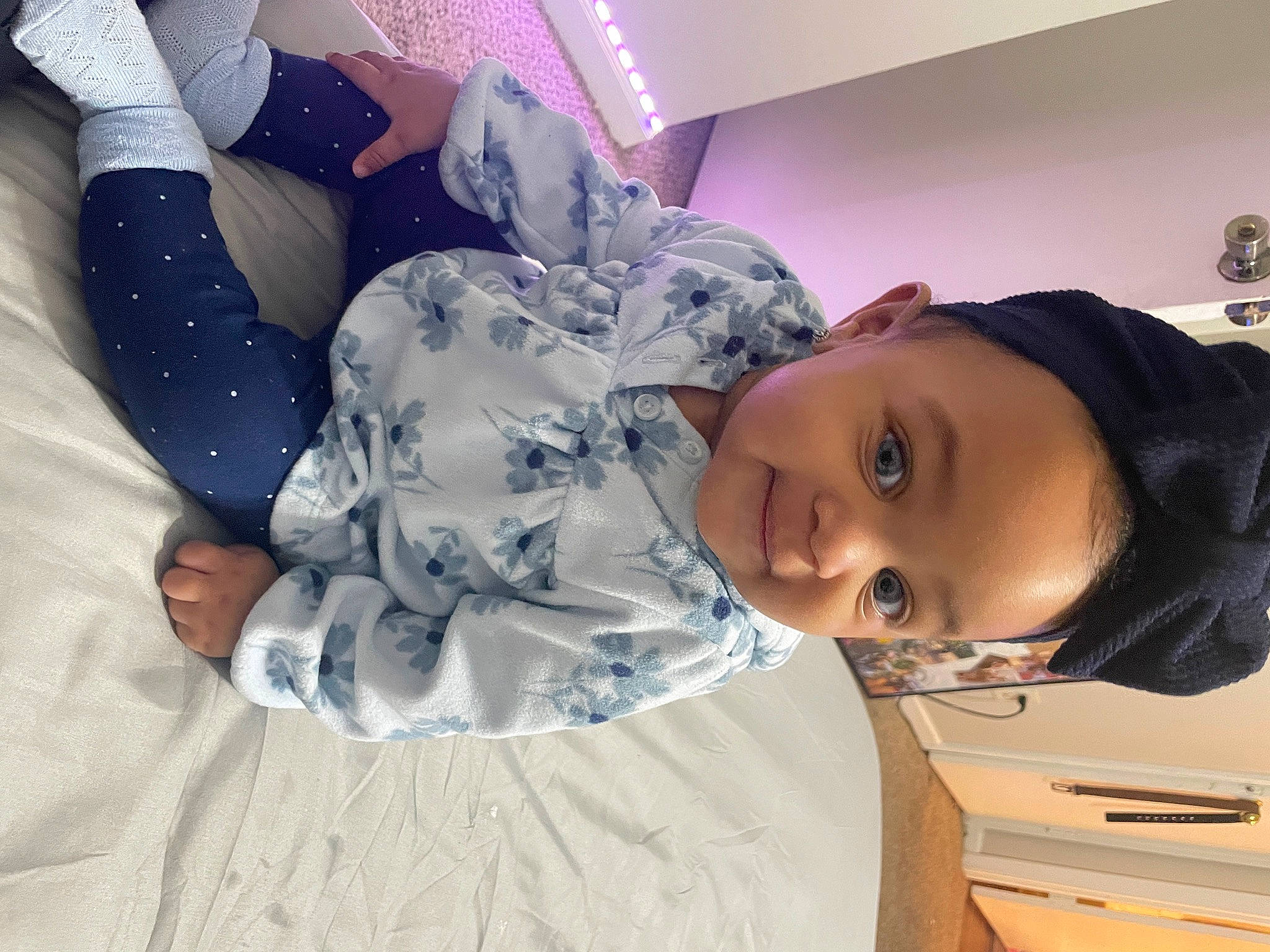 Emery is registered to the contest to win money with this photo: baby, baby_toddler_clothing, child, comfort, cool, facial_expression, fun, gesture, hairstyle, happy, hat, mouth, person, product, room, skin, sleeve, smile, thigh, toddler