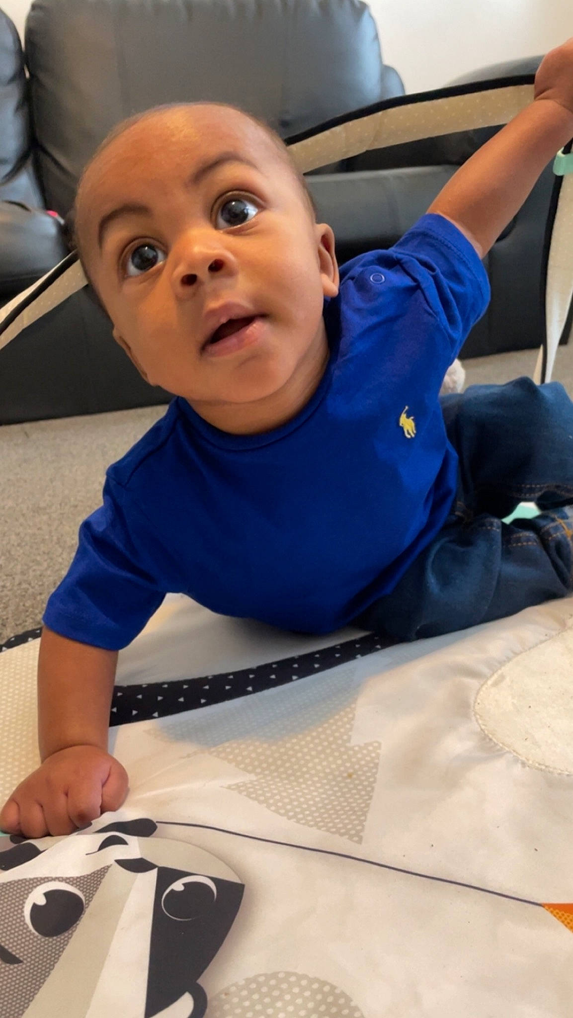 Isiah joined the competition — help win amazing prizes! automotive_design, baby, car_seat, chair, child, comfort, engineering, finger, fun, gadget, input_device, leisure, mouse, person, room, sitting, surprise, t_shirt, thumb, toddler