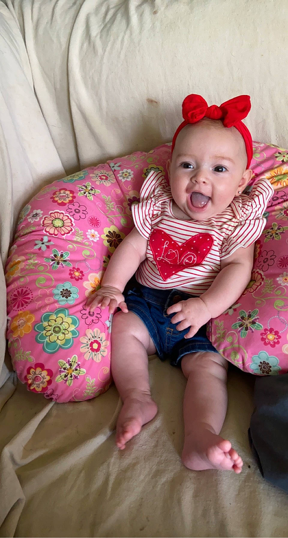 Avayah is registered to the contest to win money with this photo: arm, baby, baby_toddler_clothing, cheek, comfort, eye, facial_expression, happy, head, human, human_body, iris, leg, mouth, person, pink, skin, sleeve, smile, toddler