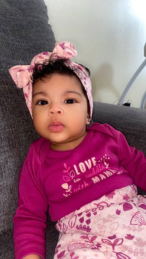 Rylee joined the competition — help win amazing prizes! baby, baby_toddler_clothing, black_hair, cap, cheek, eye, eyebrow, eyelash, face, flash_photography, happy, lip, magenta, person, pink, purple, skin, sleeve, t_shirt, toddler