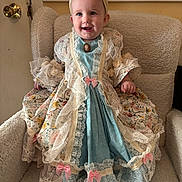 Josie joined the competition — help win amazing prizes! baby, child, infant, portrait, smiling, sitting, dress, lace, vintage, bow, headband, brooch, floral, blue, pink, armchair, indoor, home, happy, fashion