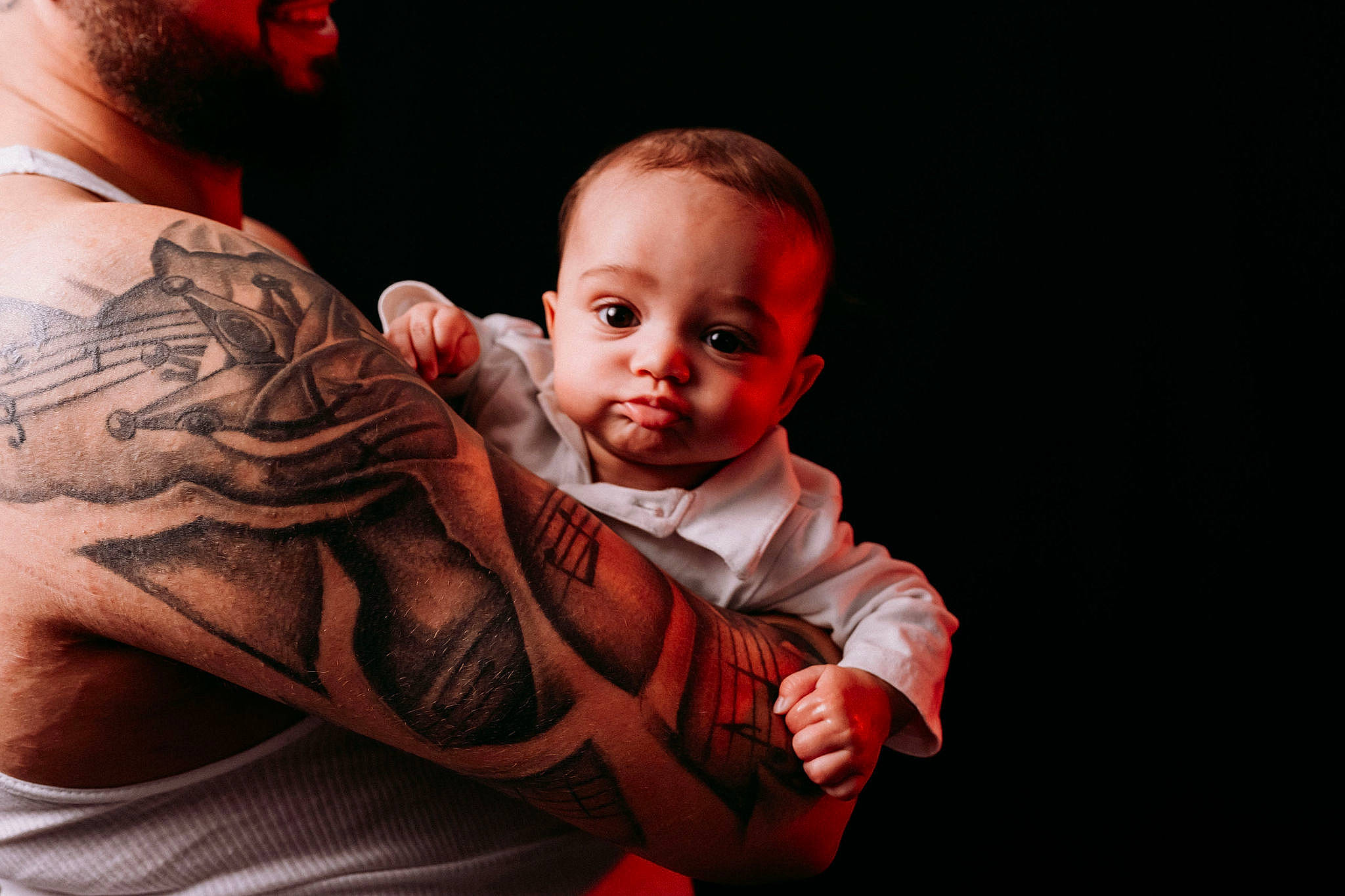 Legacy is registered to the contest to win money with this photo: arm, baby, barechested, chest, elbow, event, flash_photography, gesture, hand, happy, human_body, jewellery, pattern, person, sleeve, t_shirt, tattoo, tattoo_artist, temporary_tattoo, toddler