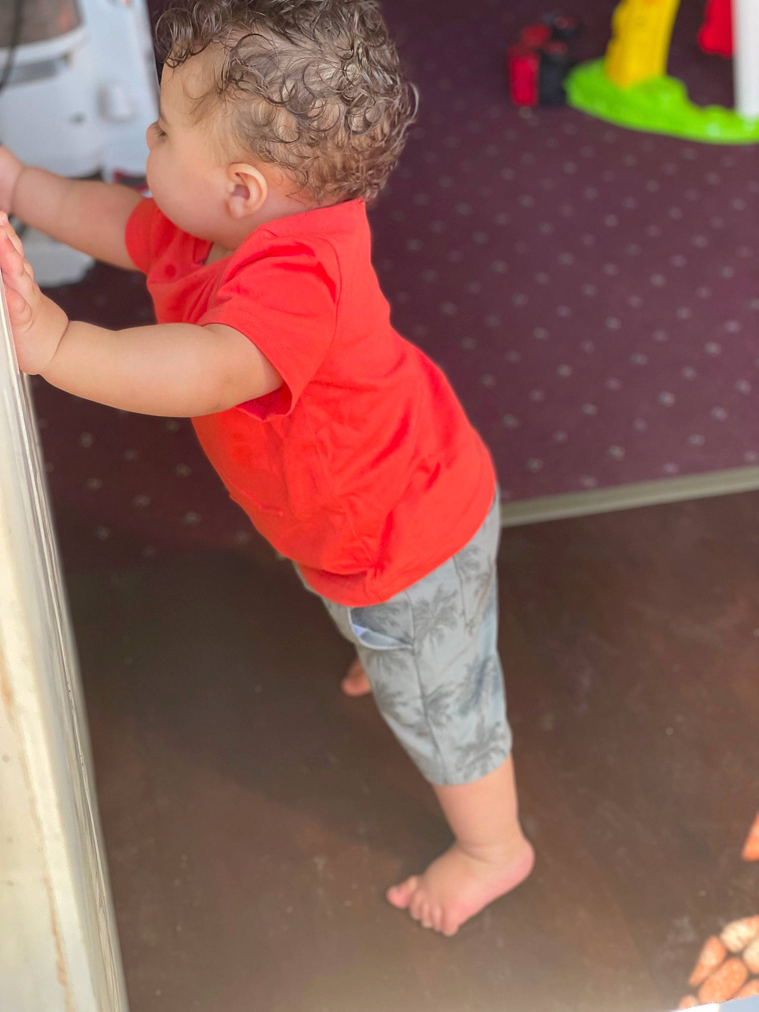 Rhyley joined the competition — help win amazing prizes! arm, baby_toddler_clothing, barefoot, calf, elbow, flooring, foot, fun, human_leg, joint, knee, leg, person, room, shorts, sleeve, t_shirt, thigh, thumb, toddler