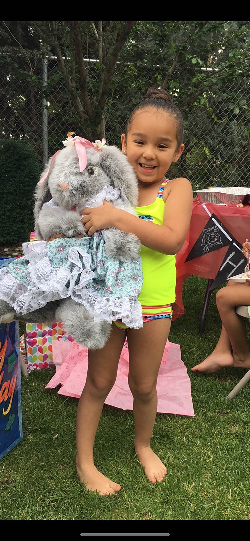 Laylah is registered to the contest to win money with this photo: beauty, child, event, fawn, fun, grass, happy, joy, leisure, mammal, person, photograph, pink, rabbit, recreation, shorts, skin, smile, snapshot, summer