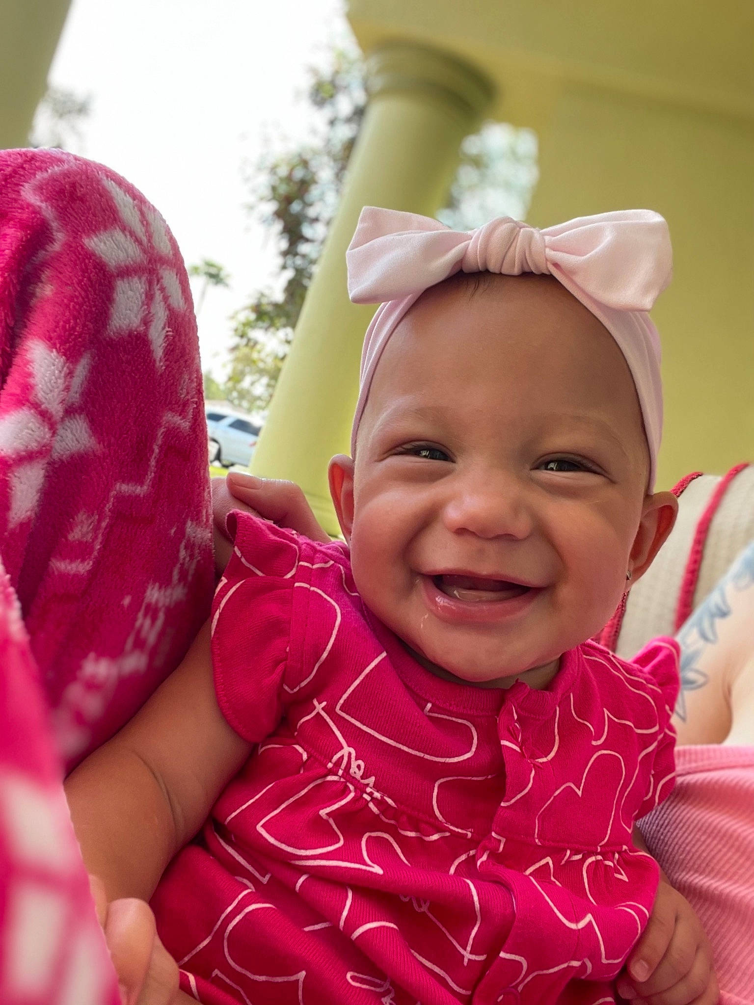 Jaelynn is registered to the contest to win money with this photo: baby, baby_toddler_clothing, child, comfort, event, fashion_accessory, fun, gesture, happy, headgear, joy, laugh, leisure, lip, magenta, pattern, people_in_nature, person, pink, smile