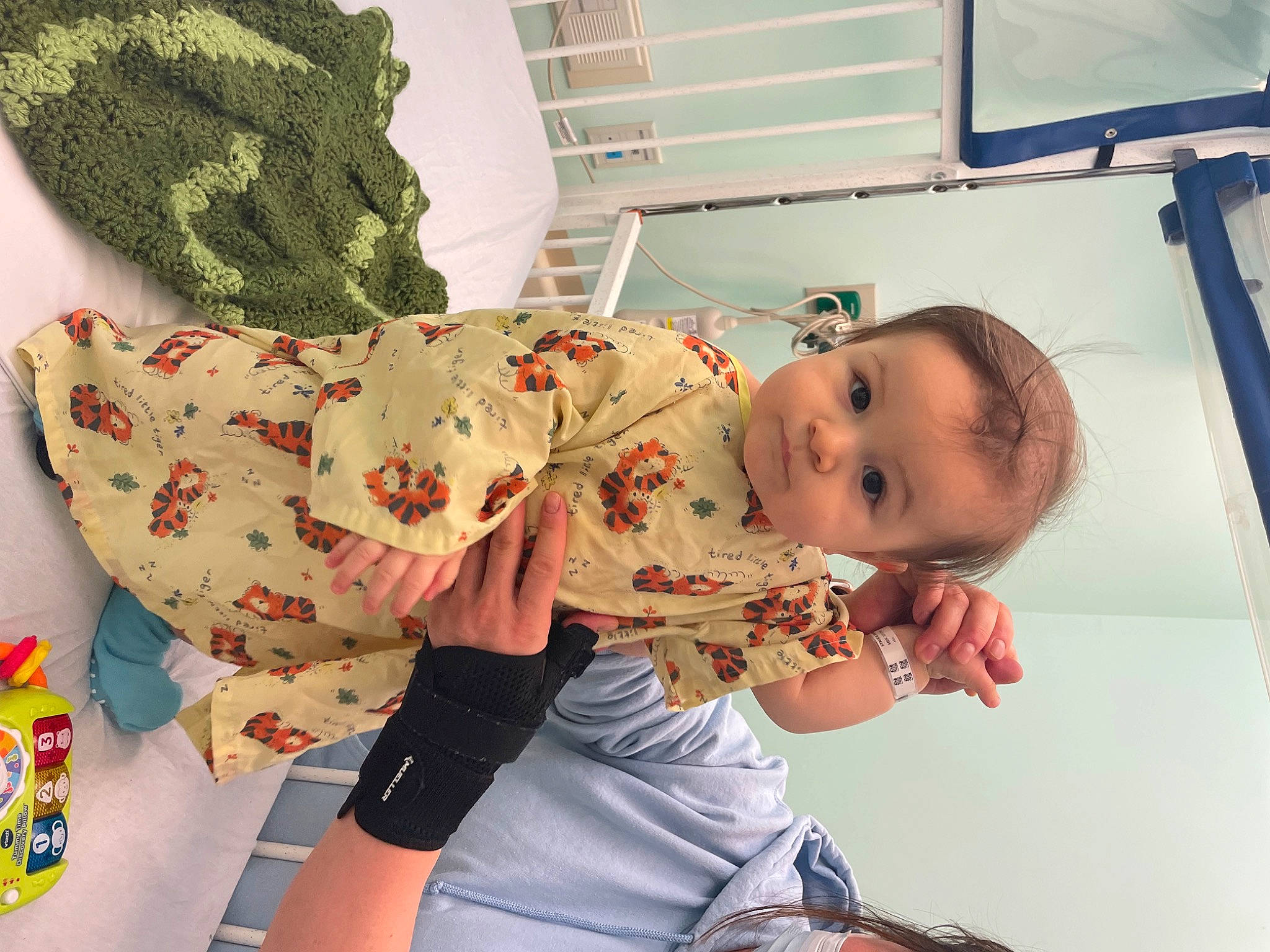 Harrison is registered to the contest to win money with this photo: baby, baby_products, baby_toddler_clothing, child, comfort, fun, happy, linens, nightwear, pajamas, pattern, person, room, skin, sleeve, smile, thigh, toddler