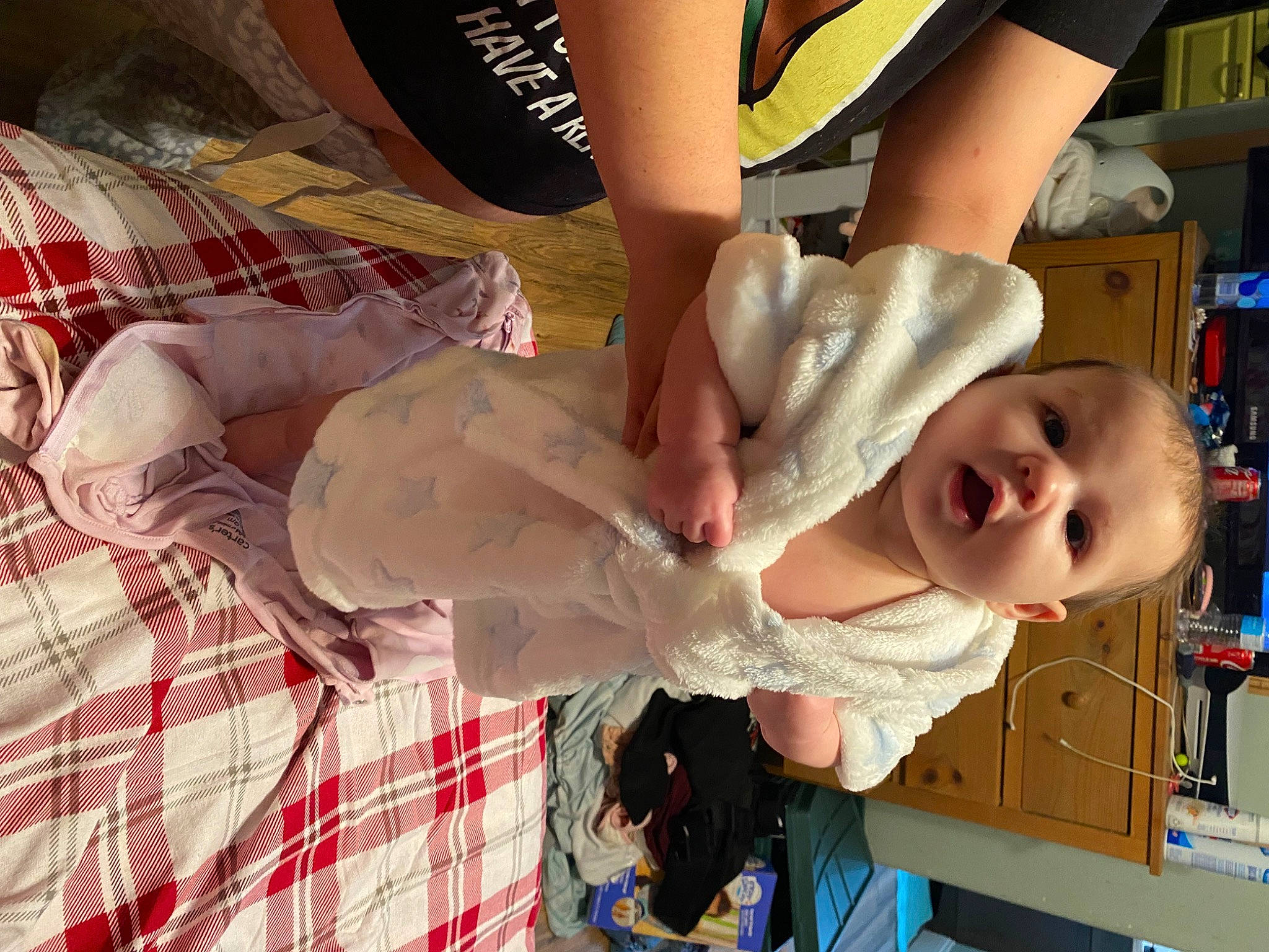 Maryjane is registered to the contest to win money with this photo: baby, baby_products, baby_toddler_clothing, chest, child, flesh, fun, gesture, happy, human_leg, pattern, person, plaid, room, shelf, smile, tartan, thigh, toddler, vacation