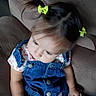 Jazlyn is registered to the contest to win money with this photo: baby, child, toddler, girl, sleeping, sitting, couch, portrait, denim, overalls, hair_bows, green_bows, floral_shirt, indoors, furniture, face, closed_eyes, photography, cute, fashion