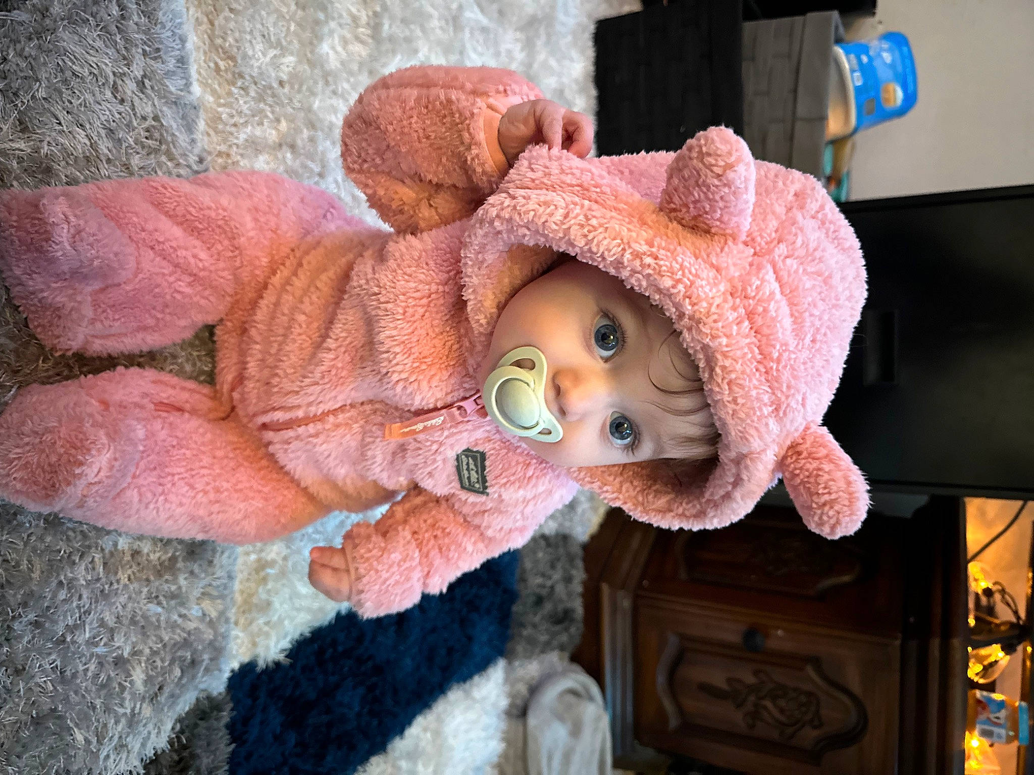 Koda is registered to the contest to win money with this photo: art, cap, creative_arts, doll, door, eye, fawn, fur, hat, head, headgear, headwear, knit_cap, person, pink, plant, sun_hat, sunglasses, toy, wood