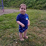 Layton joined the competition — help win amazing prizes! blue, casual_clothing, child, cute, daylight, grass, grass_field, happy, nature, outdoor, park, person, playground, shirt, shoes, shorts, smiling, summer, toddler, young_child