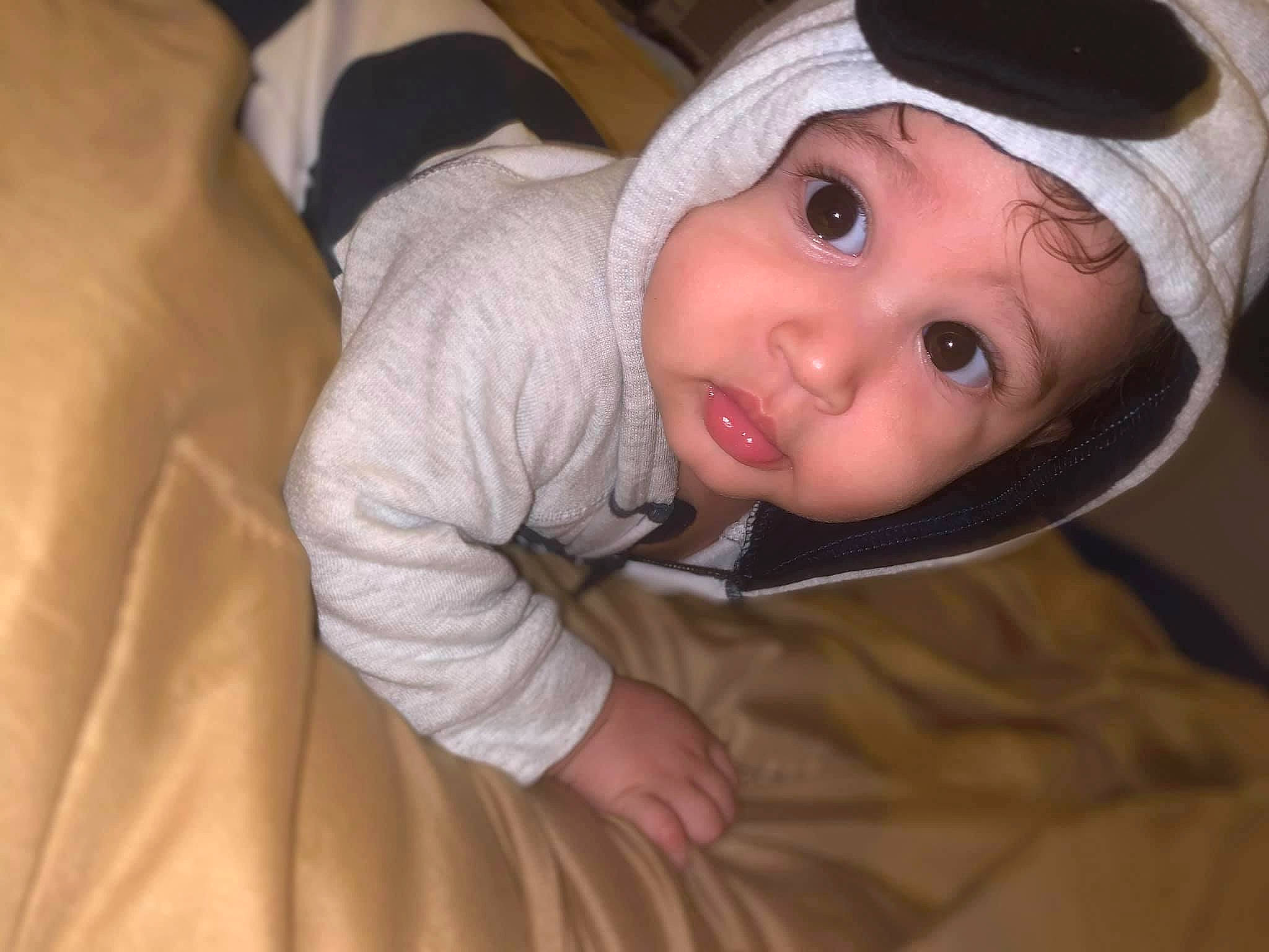 Carmelo joined the competition — help win amazing prizes! baby, baby_toddler_clothing, cap, cheek, child, comfort, eyelash, flash_photography, fun, hat, headwear, iris, lip, mouth, nose, person, portrait_photography, room, sitting, sleeve