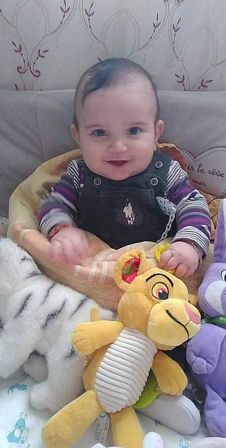 Siraj a rejoint le concours — aidez-le/la à gagner de superbes lots ! arm, baby, baby_toddler_clothing, cheek, eye, face, happy, head, human_body, iris, nose, organ, person, photograph, pink, skin, sleeve, smile, toddler, white